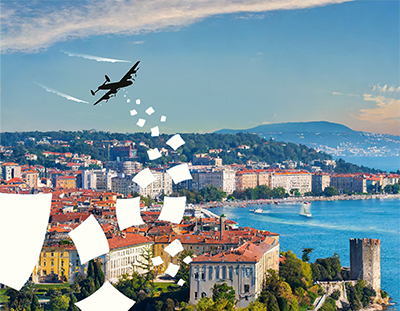 Sagoma di aereo che lascia cadere volantini sulla città di Trieste